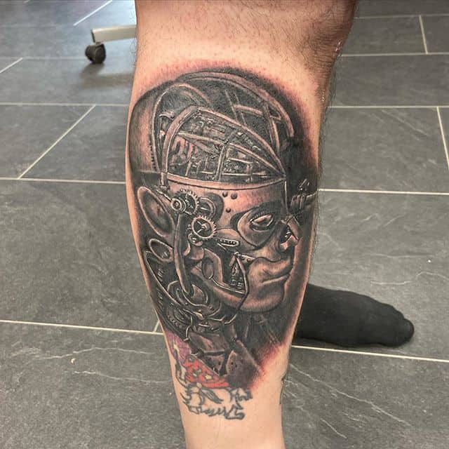 стимпанк тату на ноге