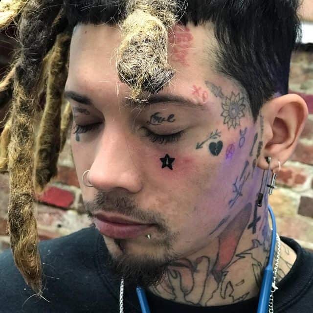 татуировки на лице